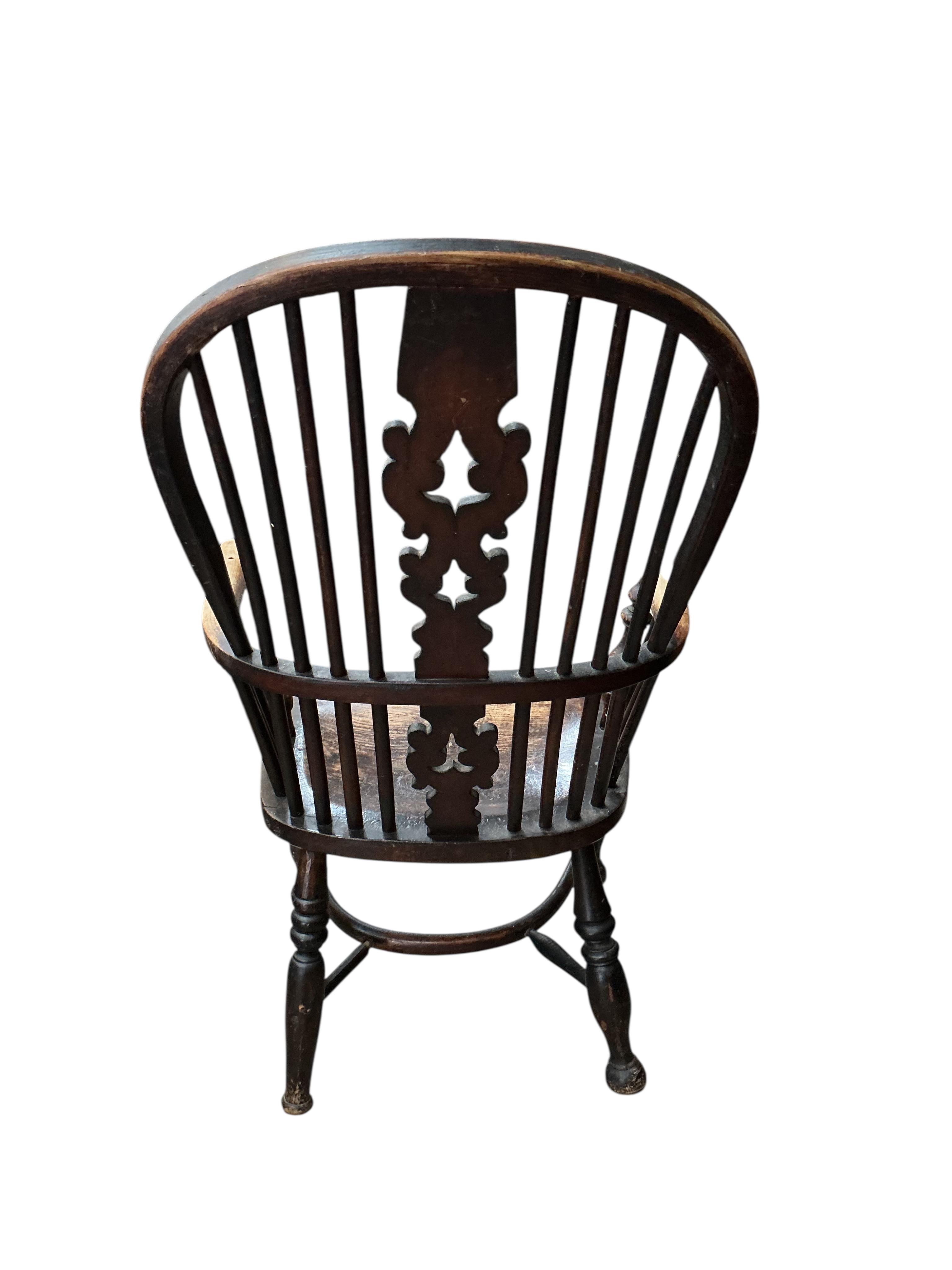 A 19th century Yorkshire area elm and beech Windsor armchair, width 56cm, depth 38cm, height 104cm